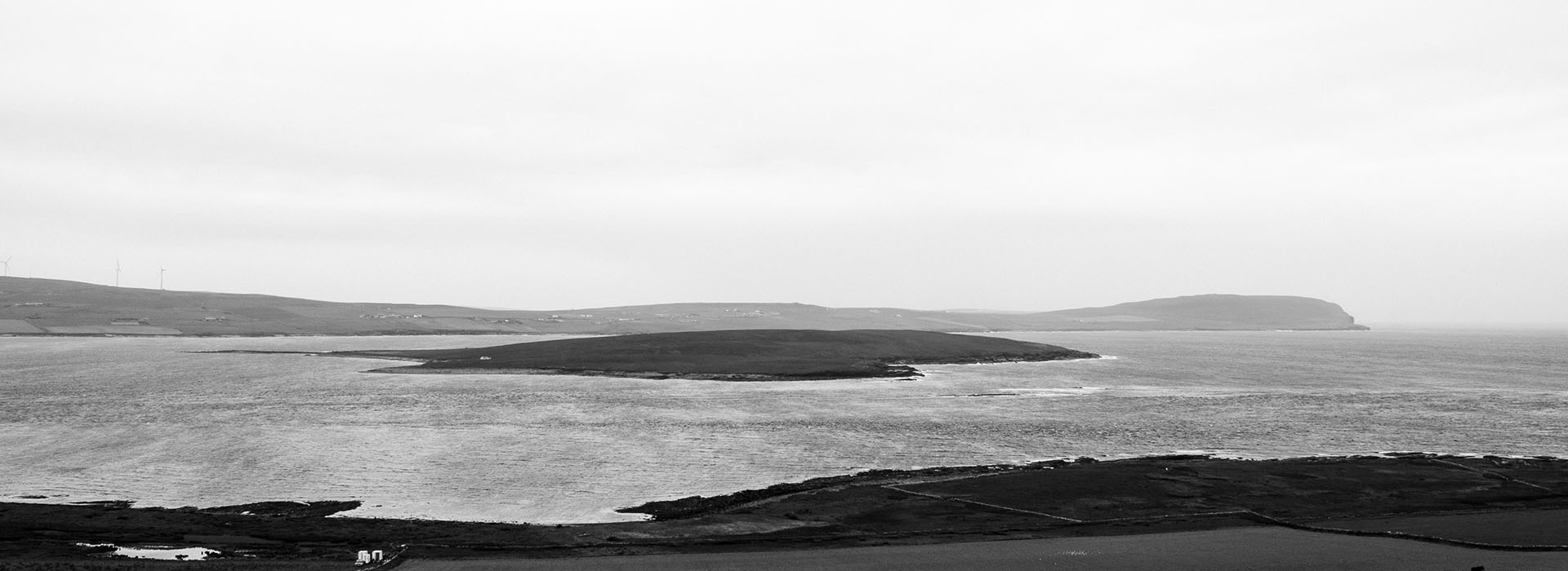 Black and white photograph of seascape in Orkney