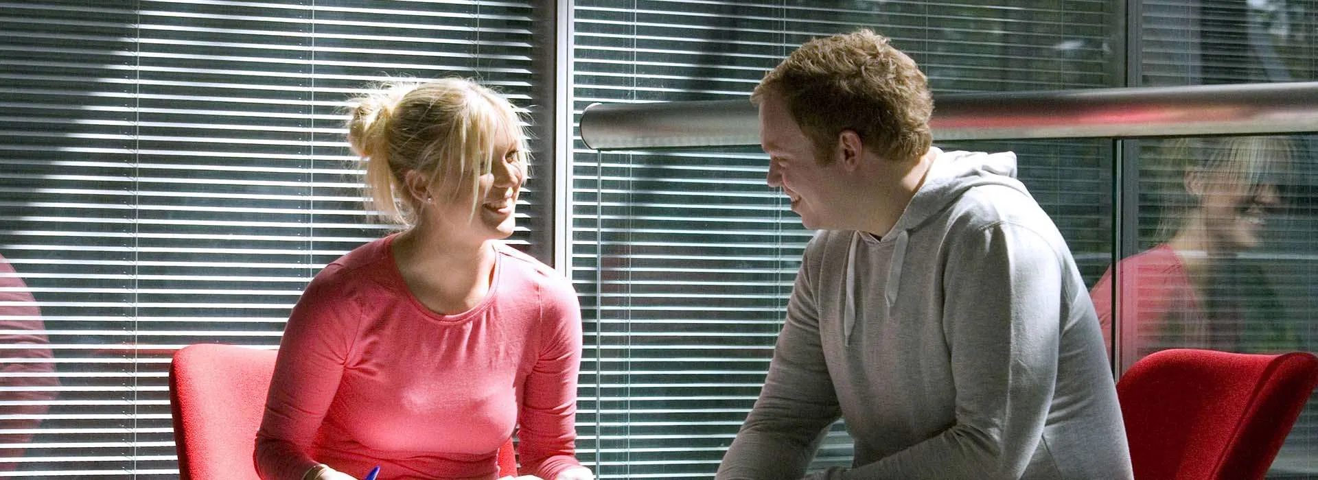 a student and adviser having a conversation