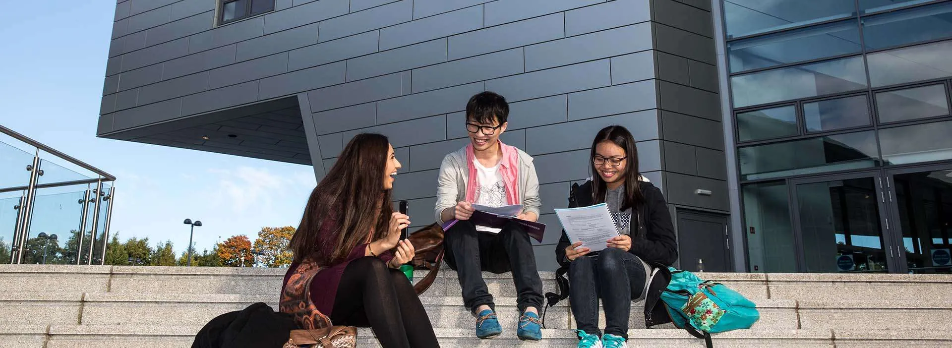 students on the steps near the Sir Ian Wood Building