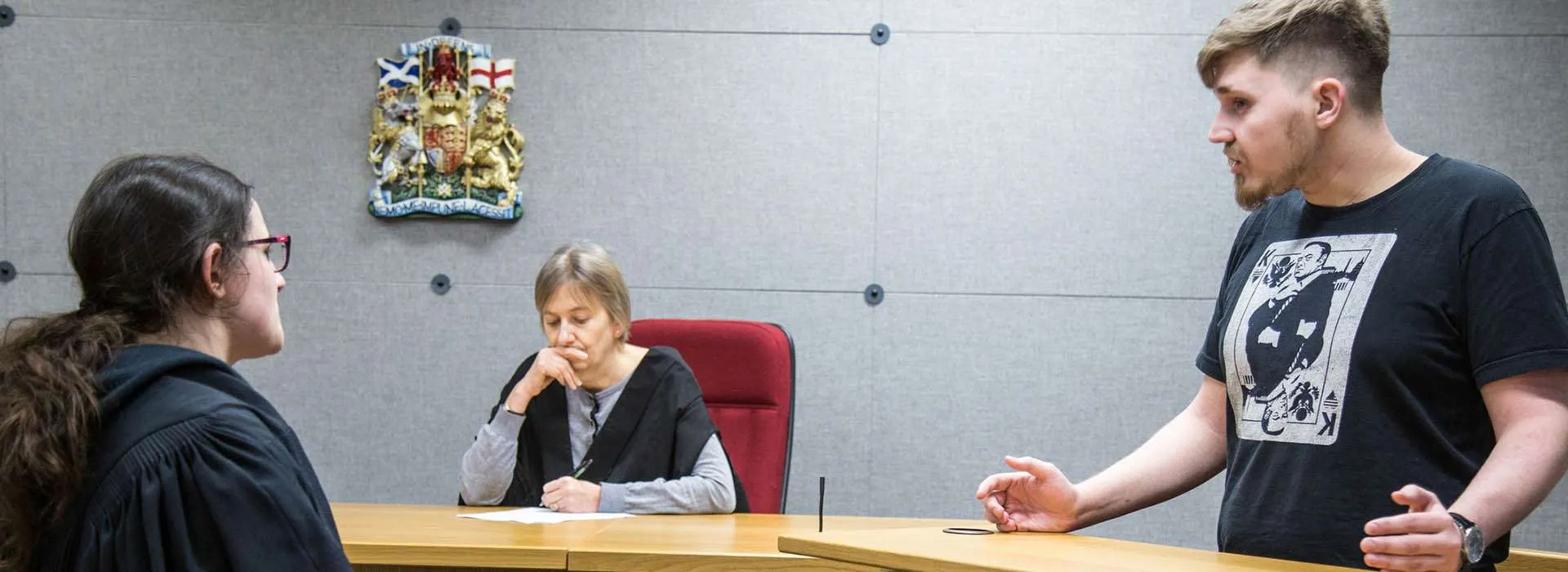 students debating in moot court