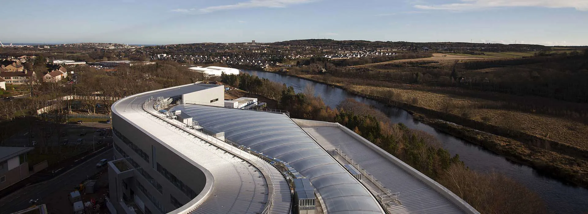 roof of sir ian wood building with landscape in the background
