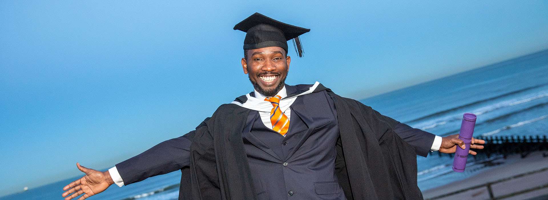 rgu graduate at aberdeen beach