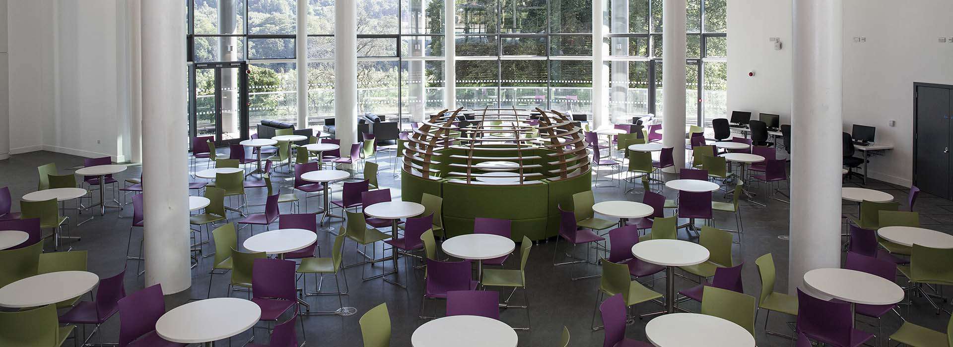 sir ian wood building atrium full of chairs