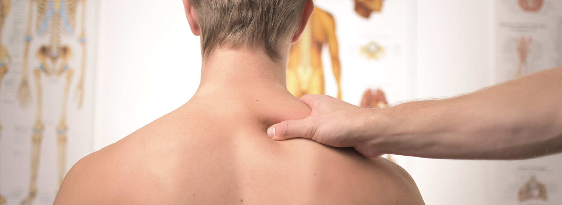 health professional grabbing patient's shoulder