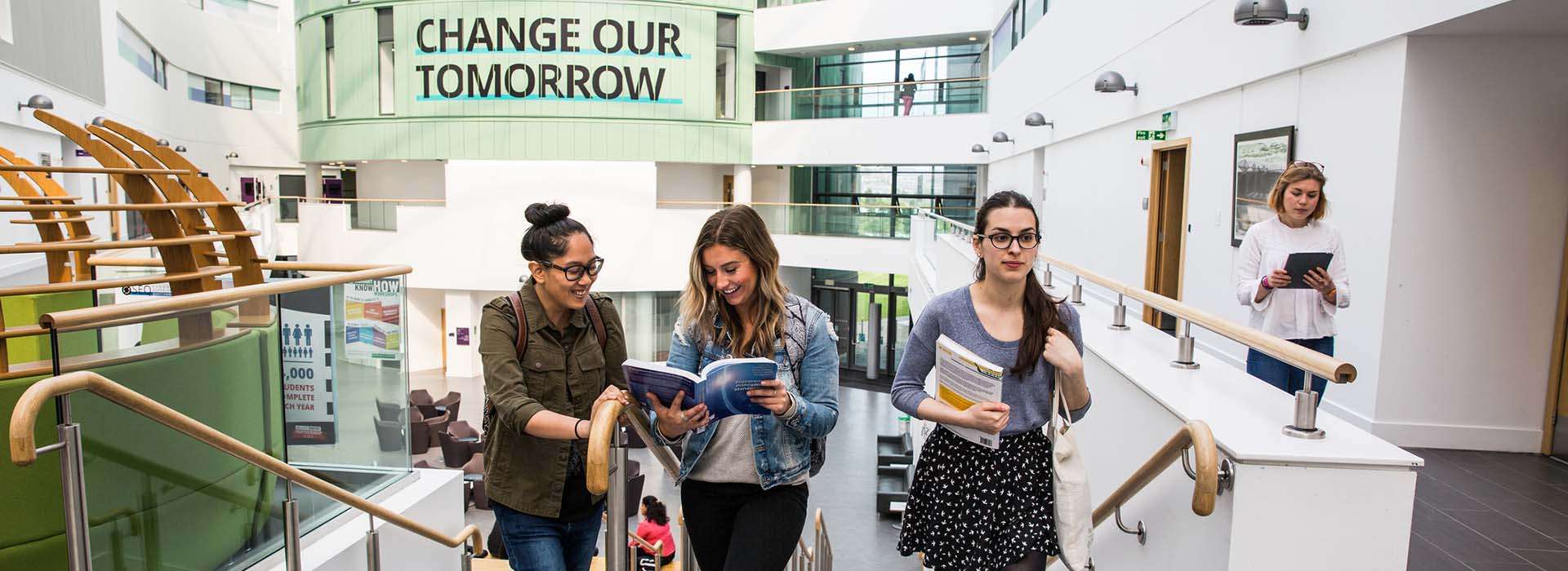 students walking up the stairs of the Sir Ian Wood Building