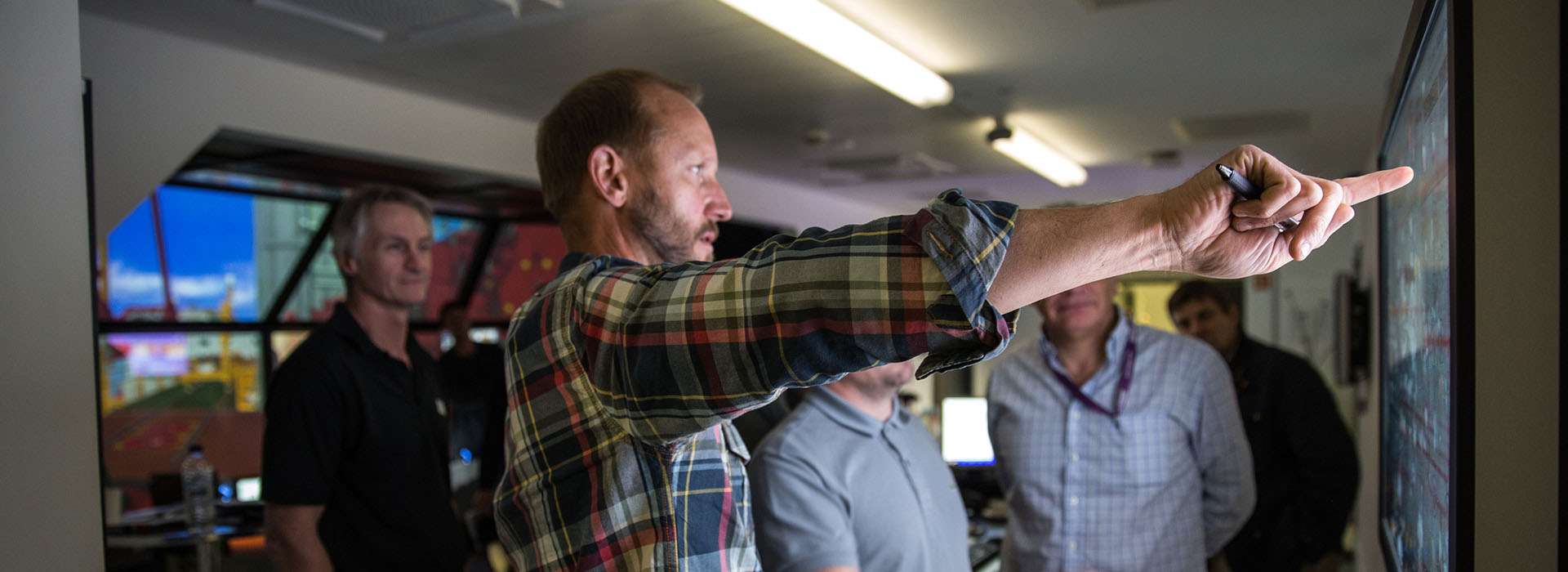 man demonstrating the DART offshore platform Simulator