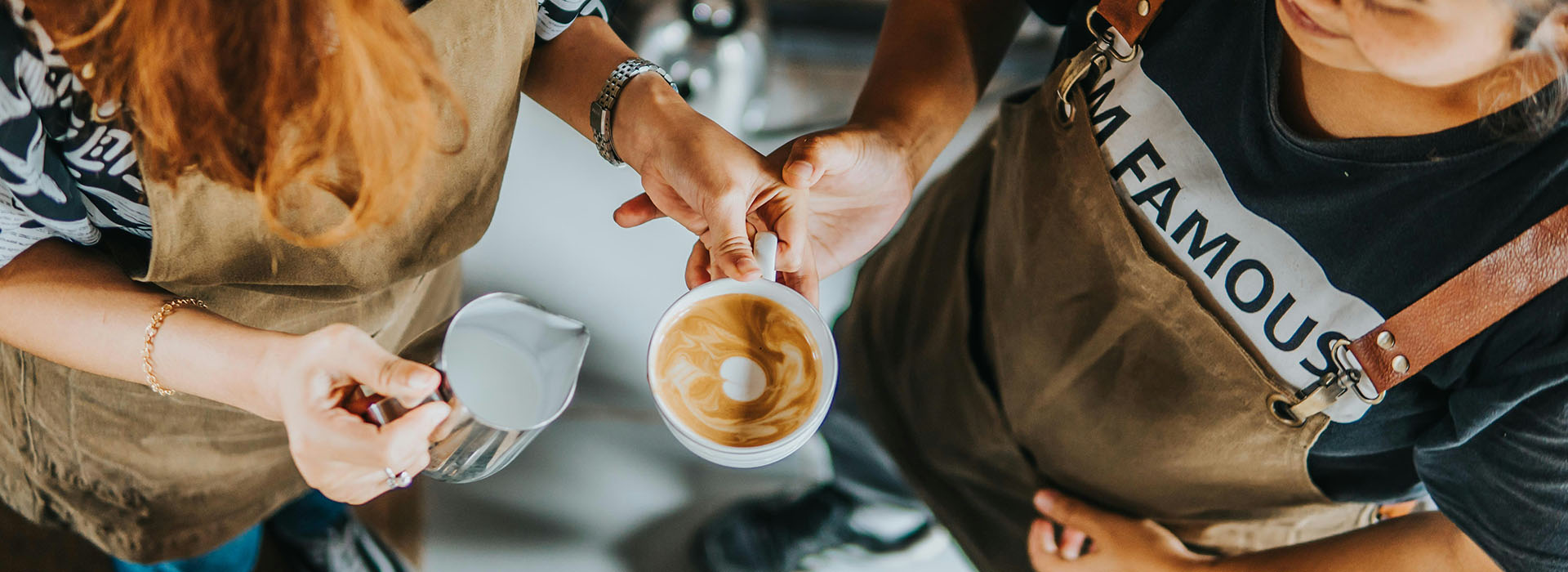 two people making a coffee