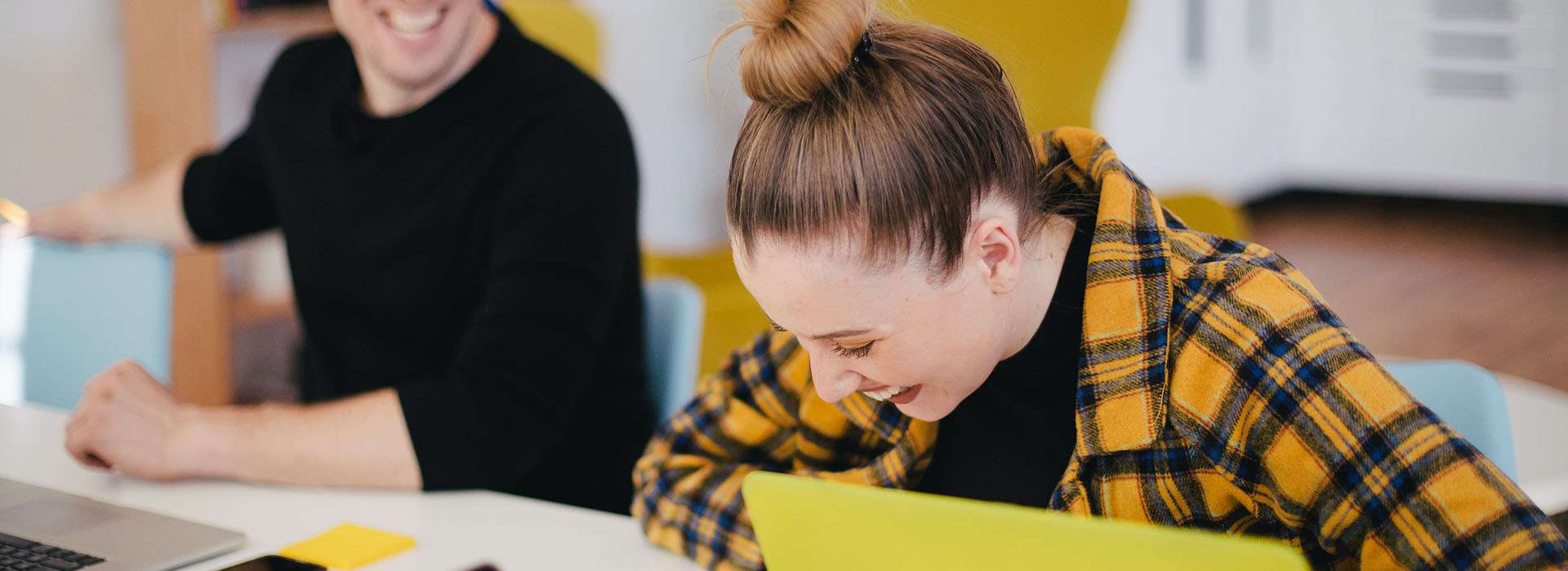 laughing woman in a meeting