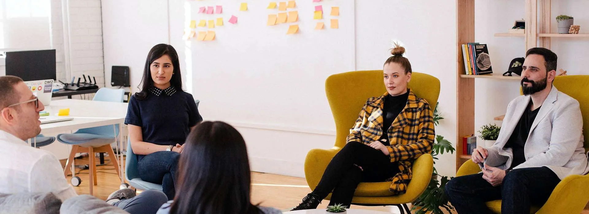 people sitting in a meeting