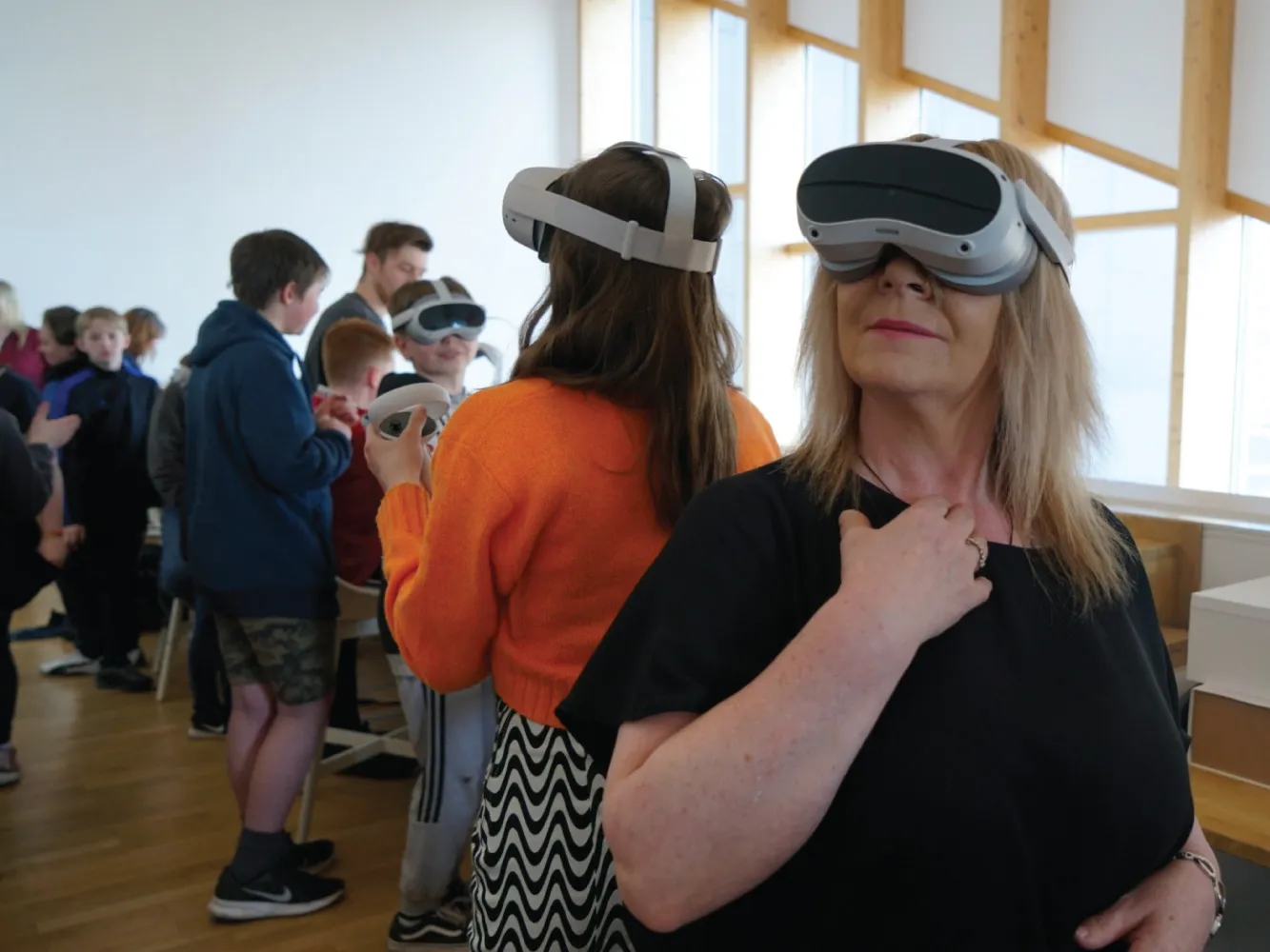 Group of people using VR headsets
