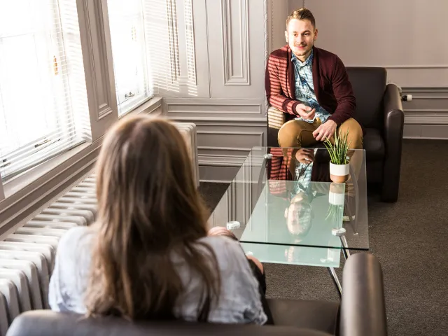 social worker and young person having a conversation