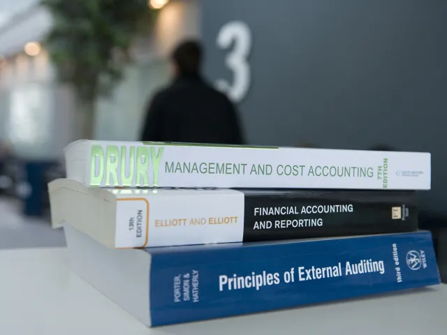 a pile of accounting books