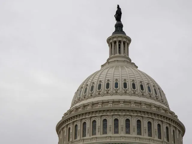 statue on top of domed building