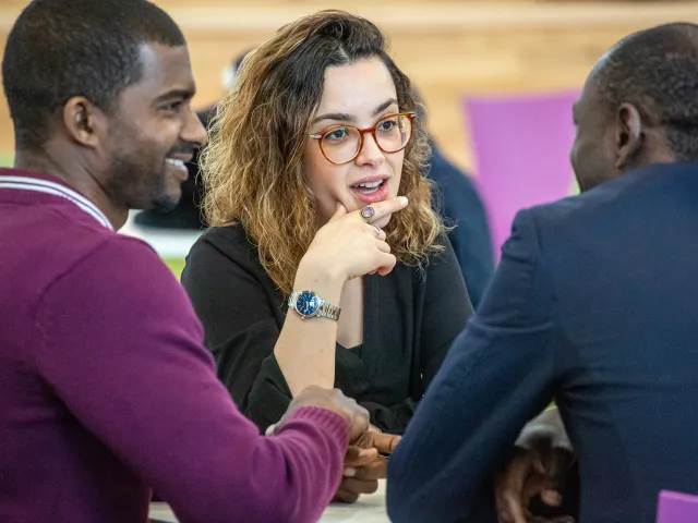 students chatting in sir ian wood building