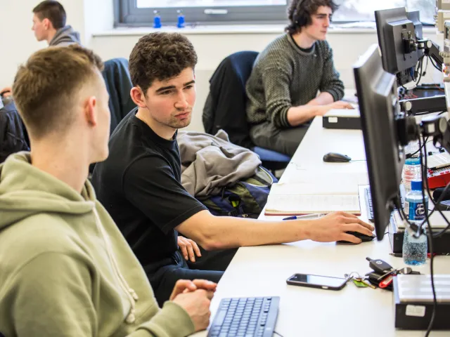 students chatting in engineering lab