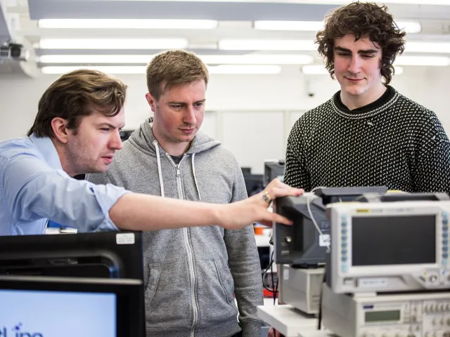 lecturer demonstrating equipment in Electronic Teaching Laboratory