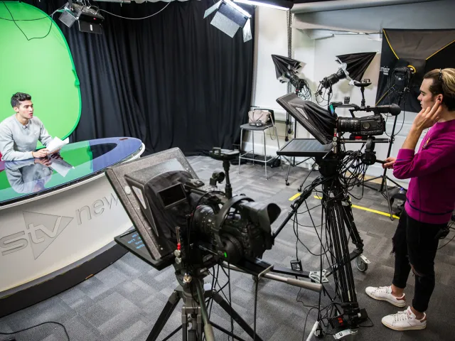 students recording in TV studio