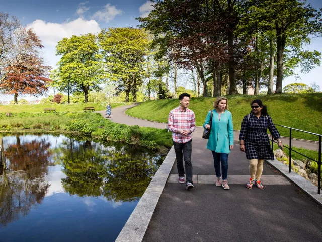 students walking around duthie park
