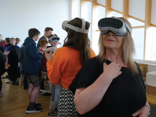 Group of people using VR headsets