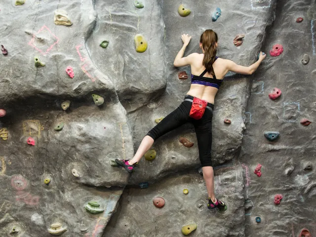 person on climbing wall