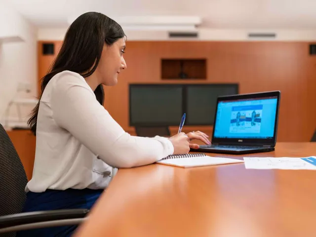 student working on a laptop