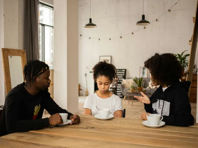 family talking at a table