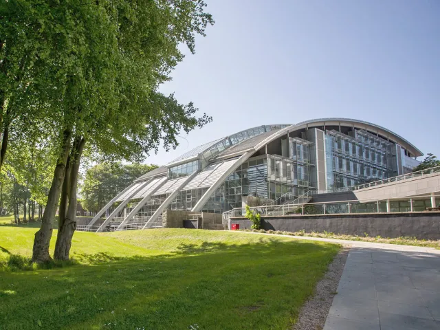 exterior of the ishbel gordon building at RGU behind some trees