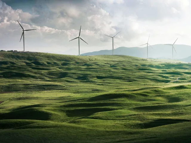 wind turbines on a hill